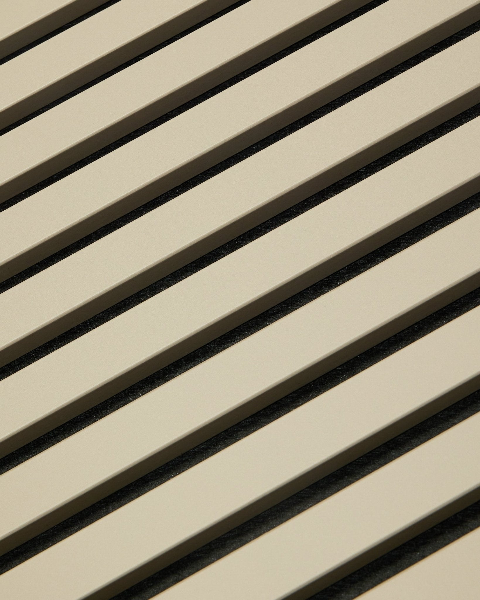 Hue Akupanel / Stone by WoodUpp, a beige acoustic panel with geometric slat pattern, 240 x 60 cm, designed to enhance acoustics in interior spaces.
