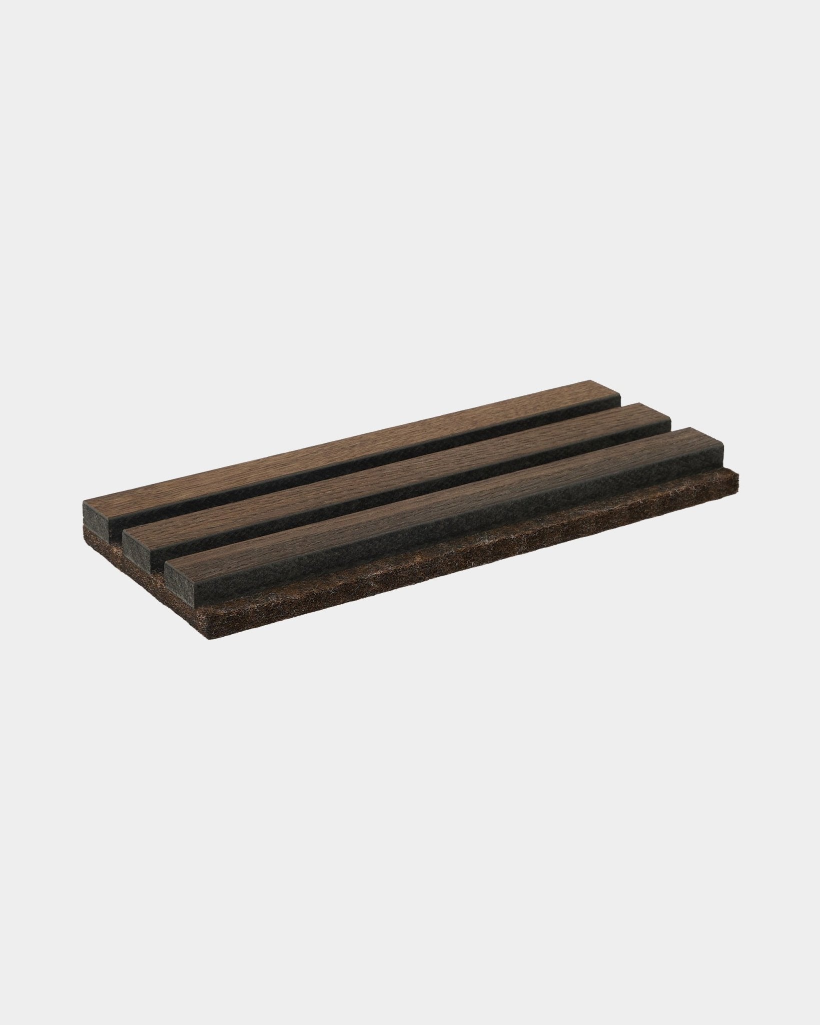 WoodUpp Tonal soap dish in dark smoked oak, crafted from natural wood, features three parallel grooves; accessory designed to complement Akupanel collections.