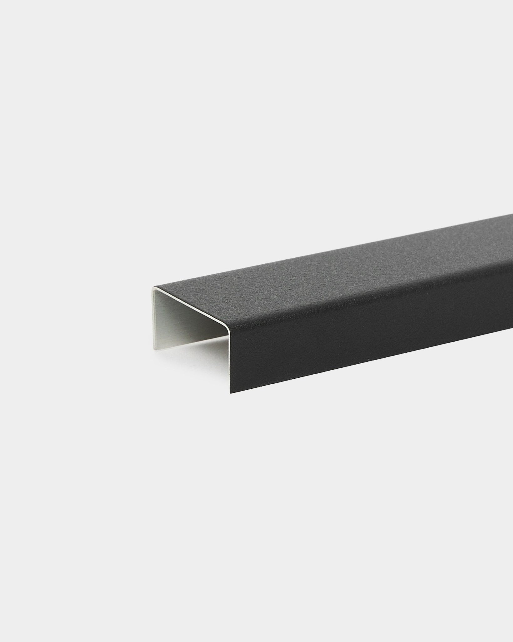 Black aluminum Liva cover (60 cm) by WoodUpp, designed as an accessory or metal trim for acoustic panels or decorative wall installations.