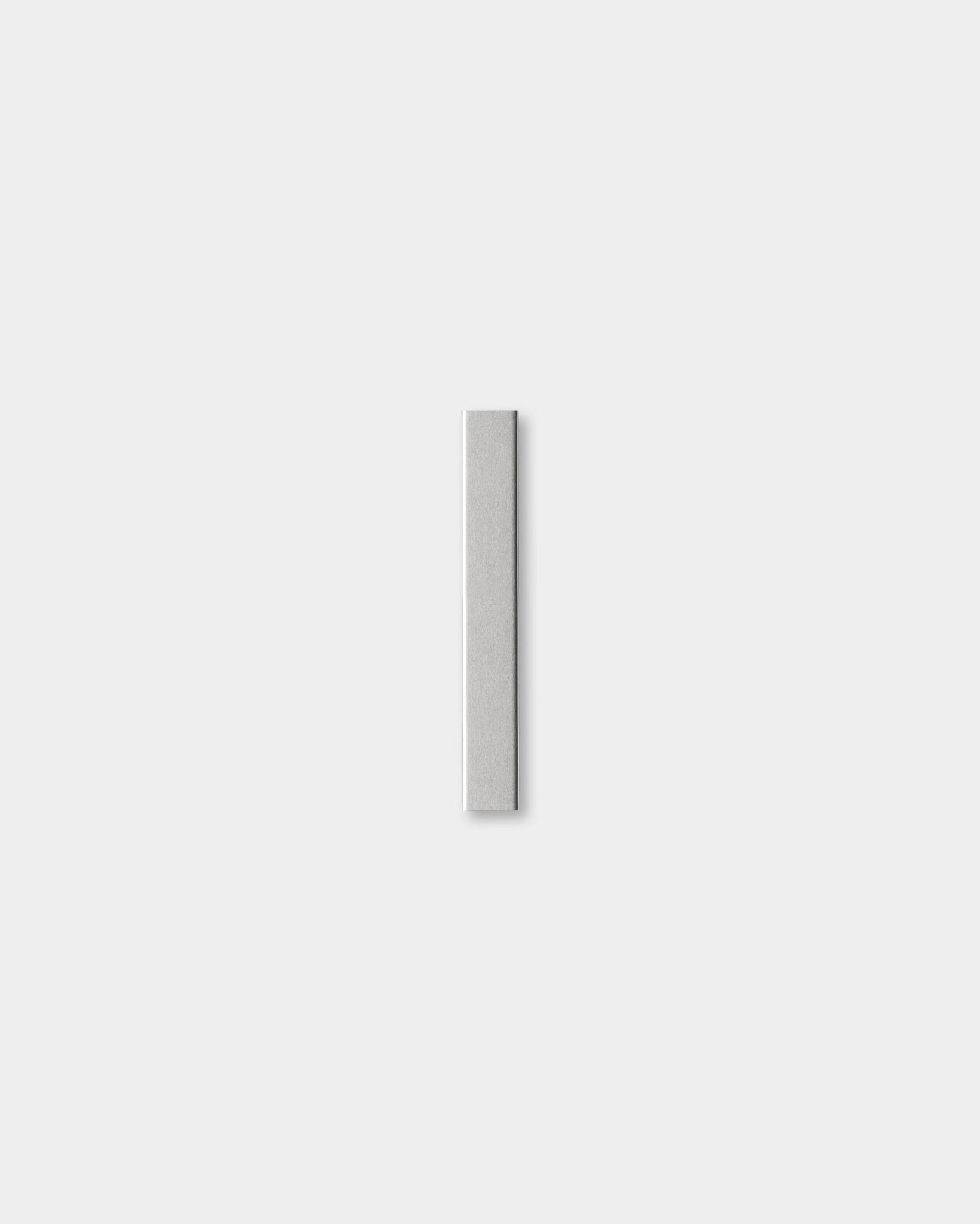 Liva | Cover by WoodUpp, a polished steel acoustic panel accessory (20 cm), is centered on a light gray background.