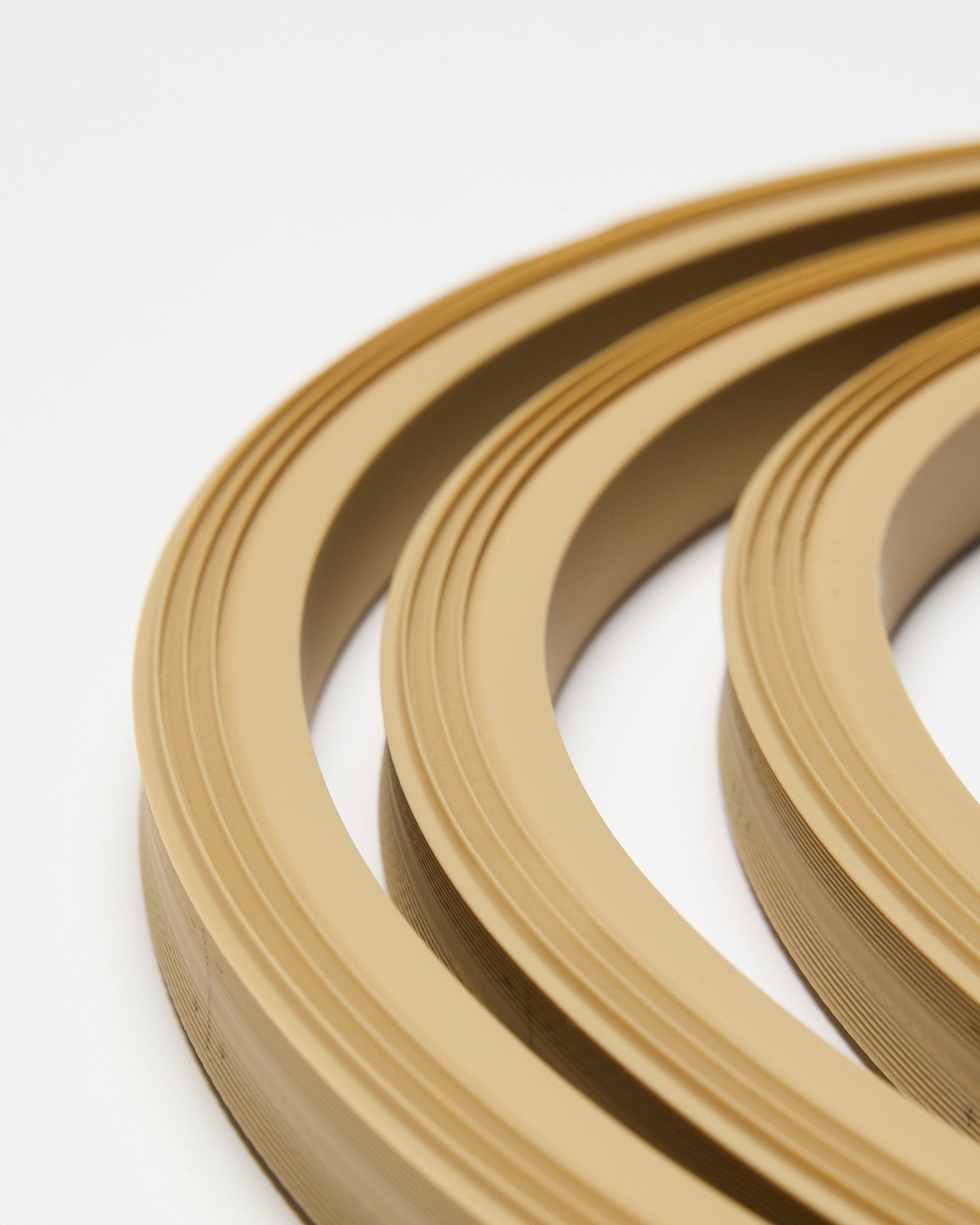 Close-up of WoodUpp Lumi LED striplight in beige, 240 cm long, shown on white background; designed to integrate with Akupanel acoustic panels or Philips Hue systems.