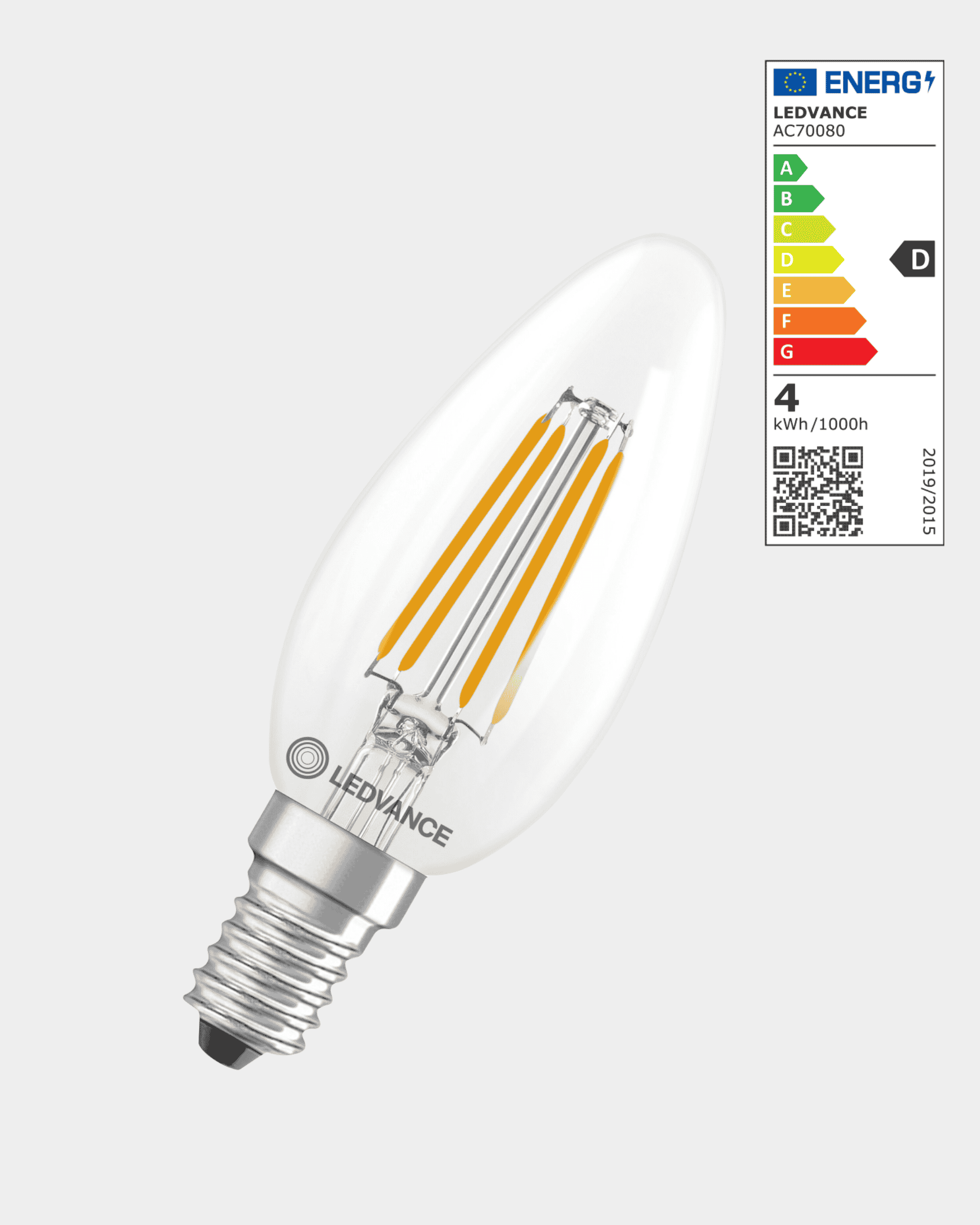 WoodUpp E14 3.4W candle-style light bulb with visible filaments, 470 lumens output, and energy label D shown in the top right corner.